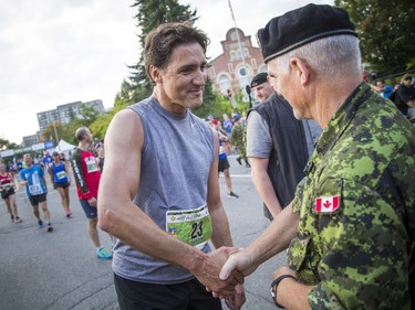 The 10th anniversary of the 2017 Canada Army Run took place Sunday, September 17, 2017 with 5K, 10K and half marathon races. Prime Minister Justin Trudeau shakes the hand of the man giving him his medal after he took part in the 5K race Sunday morning.