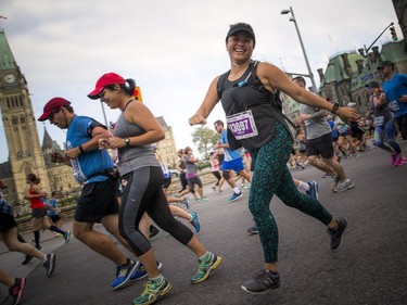 The 10th anniversary of the 2017 Canada Army Run took place Sunday, September 17, 2017 with 5K, 10K and half marathon races. Edith Parinas was all smiles as she ran past Parliament Hill Sunday morning during the 10K race.