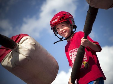 The Ottawa Senators annual Fan Fest took place Sunday, September 17, 2017 at Canadian Tire Centre. Seven-year-old Jack Petruska challenged his sister to a jousting match Sunday.   Ashley Fraser/Postmedia
Ashley Fraser, Postmedia