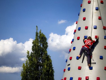 The Ottawa Senators annual Fan Fest took place Sunday, September 17, 2017 at Canadian Tire Centre. A girl climbs the inflatable climbing wall Sunday afternoon.   Ashley Fraser/Postmedia
Ashley Fraser, Postmedia