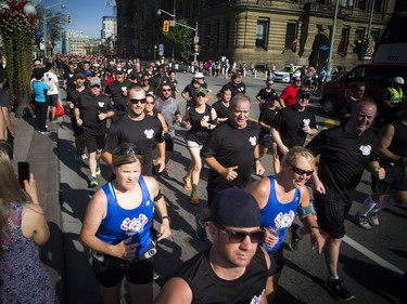Run to Remember runners arrive in Ottawa on Saturday, Sept. 23, 2017.