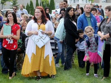 It was the first day back at school for kids in Ottawa's public board Tuesday (Sept. 5, 2017). However, for almost 600 children, it was their first day at a new school, Vimy Ridge Public School, which opened Tuesday in Findlay Creek and held an opening ceremony outside, complete with a flag raising and veteran bagpiper.  Julie Oliver/Postmedia
Julie Oliver, Postmedia