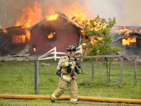 The 2600 block of Prince of Wales was blocked off to traffic Friday afternoon after a fire broke out in a barn on a farming property. Almost a dozen fire trucks were on scene to battle the massive blaze.