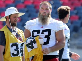 Centre Jon Gott has a cast on his right hand and wrist and won't play for the Redblacks on Sunday. Gott is the only player to have started every Redblacks regular-
 and postseason game since the team began play in 2014. Julie Oliver/Postmedia