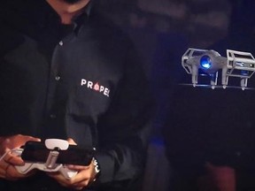 In this Tuesday, Aug. 29, 2017, photo, Propel&#039;s new &ampquot;Star Wars&ampquot; Darth Vader drone is unveiled during a demonstration for the media, in the Brooklyn borough of New York. Propel says it will start selling three ‚ÄúStar Wars‚Äù drones modeled after spacecraft from the original movies. The $179 items combine drones with online games, and up to 12 Star Wars drone pilots can battle each other. The latest chapter in the movie series, &ampquot;The Last Jedi,&ampquot; will be released Dec. 15, 2017. (AP Photo/Bebeto Mat