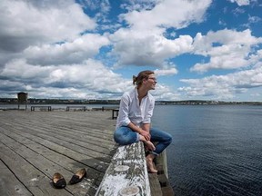 Anika Riopel, who is part of a team pitching a public swimming area for the Halifax Harbour, poses on the waterfront in Halifax on Friday, September 1, 2017. Nova Scotia may be known as Canada&#039;s Ocean Playground, but the moniker hardly applies to Halifax harbour. Almost 10 years after the city spent $333 million to clean up its massive, infamously polluted harbour, the two public beaches near its downtown remain strangely quiet -- even on hot, sunny days. Despite monitoring that shows the crysta