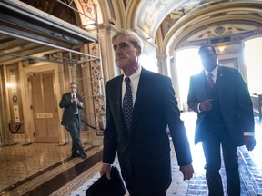 In this June 21, 2017, file photo, special counsel Robert Mueller departs after a closed-door meeting with members of the Senate Judiciary Committee about Russian meddling in the election and possible connection to the Trump campaign, at the Capitol in Washington. As Congress returns to Washington, a web of President Donald Trump's family and associates will be in the crosshairs of committees investigating whether his campaign colluded with Russia last year, as well as of the high-wattage legal team assembled by Mueller.