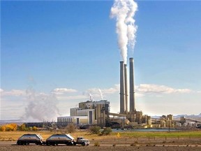 FILE - In this Oct. 23, 2009, file photo, coal trucks leave the coal-fired Hunter Power Plant just south of Castle Dale, Utah, after making a delivery. An appeals court has granted a request from President Donald Trump&#039;s administration to halt a plan for new pollution controls at Utah&#039;s oldest coal-fired power plants aimed at reducing haze near national parks. (Al Hartmann/The Salt Lake Tribune via AP, File)