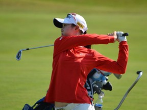 Seo-yun Kwon hits an iron during the second round. She holds a four-stroke lead at the halfway point of the tournament.