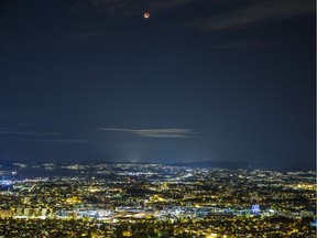 NORWAY-SCIENCE-ASTRONOMY-MOON-ECLIPSE

A so-called "super moon" hangs in the sky over Oslo during a total lunar eclipse on September 28, 2015. Skygazers were treated to a rare astronomical event when a swollen "supermoon" and lunar eclipse combined for the first time in decades, showing Earth's satellite bathed in blood-red light.    AFP PHOTO / NTB SCANPIX / STIAN LYSBERG SOLUM   +++   GERMANY OUTSTIAN LYSBERG SOLUM/AFP/Getty Images

NORWAY OUT
STIAN LYSBERG SOLUM, AFP/Getty Images