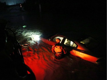 Hurricane Irma Barrels Into Puerto Rico

FAJARDO, PUERTO RICO - SEPTEMBER 06: A rescue team from the local emergency management agency inspects flooded areas after the passing of Hurricane Irma on September 6, 2017 in Fajardo, Puerto Rico. The category 5 storm is expected to pass over Puerto Rico and the Virgin Islands today, and make landfall in Florida by the weekend. (Photo by Jose Jimenez/Getty Images)
Jose Jimenez, Getty Images