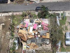 Puerto Rico Faces Extensive Damage After Hurricane Maria

DORADO, PUERTO RICO - SEPTEMBER 25:  A damaged home is seen as people deal with the aftermath of Hurricane Maria on September 25, 2017 in Dorado, Puerto Rico. Maria left widespread damage across Puerto Rico, with virtually the whole island without power or cell service.  (Photo by Joe Raedle/Getty Images)
Joe Raedle, Getty Images