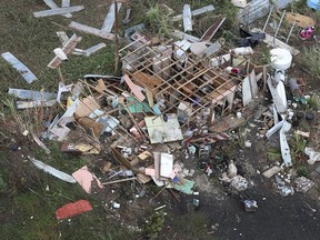 A damaged home is seen as people deal with the aftermath of Hurricane Maria on September 25, 2017 in Toa Baja, Puerto Rico. Maria left widespread damage across Puerto Rico, with virtually the whole island without power or cell service.