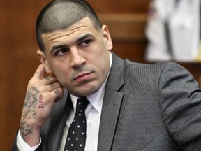 Former New England Patriots tight end Aaron Hernandez listens to a pretrial hearing in Boston in this Dec. 27, 2016 file photo.