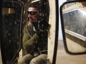 Reuters photographer Finbarr O'Reilly in Afghanistan, 2011.