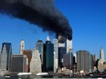 This photo taken on Sept. 11, 2001 shows the Twin Towers of the World Trade Center in New York billowing smoke after hijacked airliners crashed into them. The towers collapsed on that day, claiming 2,753 lives. Sept. 11, 2017 marks the sixteenth anniversary of the attack.