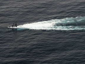 TOPSHOT-US-SKOREA-MILITARY-NAVY

TOPSHOT - In this September 26, 2016 US Navy handout photo, Republic of Korea Navy (ROKN) submarine maneuvers during a combined maritime operation in the waters East of the Korean Peninsula.   The USS Spruance joined ROKN Aegis destroyers, submarines, anti-submarine helicopters, and US and ROKN P-3 patrol aircraft in the operation that highlighted the unified naval force capabilities in defense of the Republic of Korea and region from surface, subsurface, and ballistic missile threats. Combined Forces Command, US Forces Korea Commander General Vincent. K. Brooks said, "this Combined Maritime operation is another example of the broad range of capabilities the Alliance has to confront North Korea's unacceptable behavior and the threat they pose to the stability on the Korean Peninsula, and the region." / AFP PHOTO / US NAVY / MC2 Will GASKILL / RESTRICTED TO EDITORIAL USE - MANDATORY CREDIT "AFP PHOTO / US NAVY / MC2 WILL GASKILL" - NO MARKETING - NO ADVERTISING CAMPAIGNS - DISTRIBUTED AS A SERVICE TO CLIENTS  MC2 WILL GASKILL/AFP/Getty Images

RESTRICTED TO EDITORIAL USE - MANDATORY CREDIT "AFP PHOTO / US NAVY / MC2 WILL GASKILL" - NO MARKETING - NO ADVERTISING CAMPAIGNS - DISTRIBUTED AS A SERVICE TO CLIENTS
MC2 WILL GASKILL, AFP/Getty Images