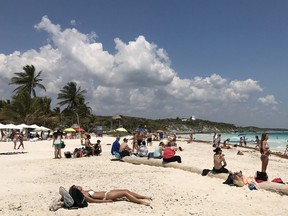 MEXICO-TOURISM

Tourists enjoy the beach in Tulum National Park, Quintana Roo state, Mexico on March 23, 2017. Tulum was a walled city of Mayan culture located in the State of Quintana Roo, southeast of Mexico, on the coast of the Caribbean Sea. It is currently a major tourist attraction of the Riviera Maya and next to it is the modern population of the same name, Tulum. / AFP PHOTO / DANIEL SLIMDANIEL SLIM/AFP/Getty Images
DANIEL SLIM, AFP/Getty Images