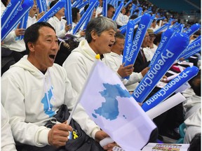 Korean fans make their voices heard during a hockey game between North and South.