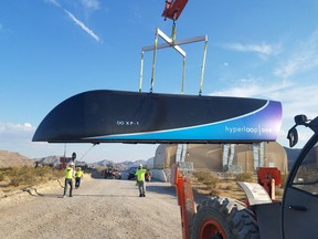 FILES-US-LIFESTYLE-TRANSPORT

(FILES) This file photo taken on July 12, 2017 and released by Hyperloop One shows the first Prototype of Hyperloop One Pod on July 12, 2017. The near-supersonic rail system known as hyperloop has passed another key milestone on its path to become reality, the US startup Hyperloop One said on August 2, 2017. Hyperloop One, which is developing a system theorized by entrepreneur Elon Musk, said that a test last week of a full hyperloop system at its private facility in the desert near Las Vegas was a success, hitting record speeds.  / AFP PHOTO / Weber Shandwick PR / HO / RESTRICTED TO EDITORIAL USE - MANDATORY CREDIT "AFP PHOTO / Weber Shandwick PR" - NO MARKETING NO ADVERTISING CAMPAIGNS - DISTRIBUTED AS A SERVICE TO CLIENTS  HO/AFP/Getty Images

RESTRICTED TO EDITORIAL USE - MANDATORY CREDIT "AFP PHOTO / Weber Shandwick PR" - NO MARKETING NO ADVERTISING CAMPAIGNS - DISTRIBUTED AS A SERVICE TO CLIENTS
HO, AFP/Getty Images