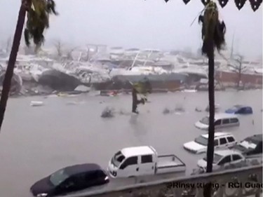 FRANCE-SAINT MARTIN-OVERSEAS-CARRIBBEAN-US-WEATHER-STORM-IRMA-HU

A handout grab image made from a video released on September 6, 2017 by RCI.fm shows flooded streets and damage on the French overseas island of Saint-Martin, filmed from a terrace of the Beach Plaza hotel after high winds from Hurricane Irma hit the island.  Monster Hurricane Irma slammed into Caribbean islands today after making landfall in Barbuda, packing ferocious winds and causing major flooding in low-lying areas. As the rare Category Five storm barreled its way across the Caribbean, it brought gusting winds of up to 185 miles per hour (294 kilometers per hour), weather experts said. / AFP PHOTO / rci.fm / Rinsy XIENG / RESTRICTED TO EDITORIAL USE - MANDATORY CREDIT "AFP PHOTO / RCI.fm / Rinsy XIENG" - NO MARKETING NO ADVERTISING CAMPAIGNS - DISTRIBUTED AS A SERVICE TO CLIENTS - -RINSY XIENG/AFP/Getty Images

RESTRICTED TO EDITORIAL USE - MANDATORY CREDIT "AFP PHOTO / RCI.fm / Rinsy XIENG" - NO MARKETING NO ADVERTISING CAMPAIGNS - DISTRIBUTED AS A SERVICE TO CLIENTS - -
RINSY XIENG, AFP/Getty Images