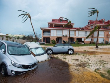 FRANCE-OVERSEAS-CARIBBEAN-WEATHER-HURRICANE

A photo taken on September 6, 2017 shows cars on the beach in Marigot, near the Bay of Nettle, on the French Collectivity of Saint Martin, after the passage of Hurricane Irma. France, the Netherlands and Britain on September 7 sent water, emergency rations and rescue teams to their stricken territories in the Caribbean hit by Hurricane Irma, which has killed at least 10 people. The worst-affected island so far is Saint Martin, which is divided between the Netherlands and France, where eight of the 10 confirmed deaths took place.  / AFP PHOTO / Lionel CHAMOISEAULIONEL CHAMOISEAU/AFP/Getty Images
LIONEL CHAMOISEAU, AFP/Getty Images