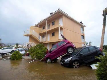 FRANCE-OVERSEAS-CARIBBEAN-WEATHER-HURRICANE

A photo taken on September 6, 2017 shows cars piled on top of one another in Marigot, near the Bay of Nettle, on the French Collectivity of Saint Martin, after the passage of Hurricane Irma. France, the Netherlands and Britain on September 7 sent water, emergency rations and rescue teams to their stricken territories in the Caribbean hit by Hurricane Irma, which has killed at least 10 people. The worst-affected island so far is Saint Martin, which is divided between the Netherlands and France, where eight of the 10 confirmed deaths took place.  / AFP PHOTO / Lionel CHAMOISEAULIONEL CHAMOISEAU/AFP/Getty Images
LIONEL CHAMOISEAU, AFP/Getty Images