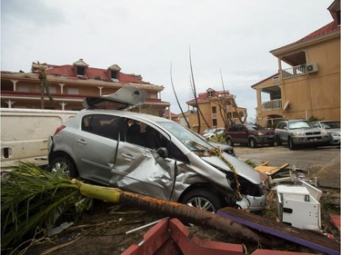 FRANCE-OVERSEAS-CARIBBEAN-WEATHER-HURRICANE

A photo taken on September 6, 2017 shows a damaged car and debris in Marigot, near the Bay of Nettle, on the French Collectivity of Saint Martin, after the passage of Hurricane Irma. France, the Netherlands and Britain on September 7 sent water, emergency rations and rescue teams to their stricken territories in the Caribbean hit by Hurricane Irma, which has killed at least 10 people. The worst-affected island so far is Saint Martin, which is divided between the Netherlands and France, where eight of the 10 confirmed deaths took place.  / AFP PHOTO / Lionel CHAMOISEAULIONEL CHAMOISEAU/AFP/Getty Images
LIONEL CHAMOISEAU, AFP/Getty Images
