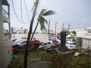 FRANCE-OVERSEAS-CARIBBEAN-WEATHER-HURRICANE

A photo taken on September 6, 2017 shows cars piled on top of one another at the Hotel Mercure in Marigot, near the Bay of Nettle, on the French Collectivity of Saint Martin, after the passage of Hurricane Irma. France, the Netherlands and Britain on September 7 sent water, emergency rations and rescue teams to their stricken territories in the Caribbean hit by Hurricane Irma, which has killed at least 10 people. The worst-affected island so far is Saint Martin, which is divided between the Netherlands and France, where eight of the 10 confirmed deaths took place.  / AFP PHOTO / Lionel CHAMOISEAULIONEL CHAMOISEAU/AFP/Getty Images
LIONEL CHAMOISEAU, AFP/Getty Images
