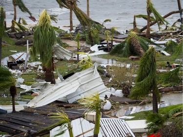 FRANCE-OVERSEAS-CARIBBEAN-WEATHER-HURRICANE

A photo taken on September 6, 2017 shows destroyed palm trees, outside the "Mercure" hotel in Marigot, on the Bay of Nettle, on the island of Saint-Martin in the northeast Caribbean, after the passage of Hurricane Irma.  France, the Netherlands and Britain on September 7 sent water, emergency rations and rescue teams to their stricken territories in the Caribbean hit by Hurricane Irma, which has killed at least 10 people. The worst-affected island so far is Saint Martin, which is divided between the Netherlands and France, where eight of the 10 confirmed deaths took place.   / AFP PHOTO / Lionel CHAMOISEAULIONEL CHAMOISEAU/AFP/Getty Images
LIONEL CHAMOISEAU, AFP/Getty Images