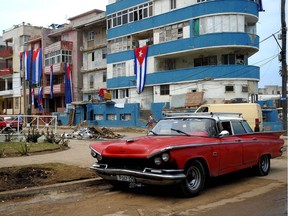CUBA-HURRICAN-IRMA-AFTERMATH

Cubans flags are hung from balconies to dry during the cleanup ensuing the passage of Hurricane Irma in Havana, on September 12, 2017. / AFP PHOTO / YAMIL LAGEYAMIL LAGE/AFP/Getty Images
YAMIL LAGE, AFP/Getty Images