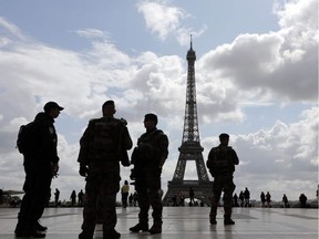 FILES-FRANCE-UNREST-ATTACKS-SECURITY

(FILES) This file photograph taken on September 12, 2017, shows policemen and French soldiers of "Operation Sentinelle" security mission as they patrol on the Trocadero Square in front of the Eiffel Tower in Paris. 'Operation Sentinelle', set up after the attacks in January 2015, was once again the target of what is considered as a terrorist attack on early September 15, 2017 in Paris. A man armed with a knife assaulted a soldier on patrol in a subway station, without causing any injuries. / AFP PHOTO / LUDOVIC MARINLUDOVIC MARIN/AFP/Getty Images

TO GO WITH AFP STORY BY PAULINE TALAGRAND
LUDOVIC MARIN, AFP/Getty Images
