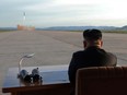 This undated picture released from North Korea's official Korean Central News Agency (KCNA) on September 16, 2017 shows North Korean leader Kim Jong-Un inspecting a launching drill of the medium-and-long range strategic ballistic rocket Hwasong-12 at an undisclosed location