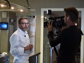 French chef Sebastien Bras speaks to a journalist in his three-star restaurant Le Suquet, in Laguiole, southern France, on September 21, 2017, after announcing that he asked not to be included in the Michelin Guide starting in 2018.