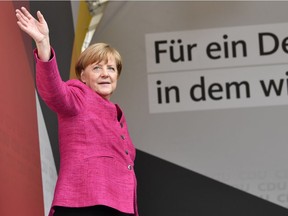 German Chancellor and head of the CDU party Angela Merkel arrives for an electoral meeting in the southern town of Ulm on Friday. Elections are this weekend.