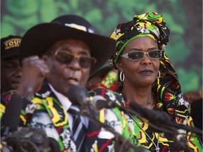 Zimbabwean First Lady Grace Mugabe, right, is seen with her husband, 93-year-old Robert Mugabe, at a rally in Gweru, Zimbabwe, in early September.
