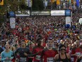 Waves of runners make their way up Elgin Street at the start of the Canada Army Run last year on Sept. 18.