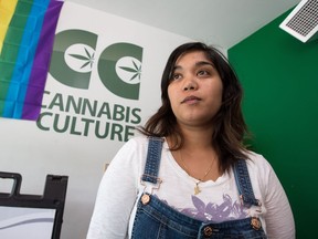 Ming Saad, who describes herself as a "volunteer bud tender" at Cannabis Culture on Bank Street, contemplates the news that the province announced a new arm of the LCBO would be responsible for selling recreational marijuana in Ontario and that all other establishments currently selling pot would be permanently shut down. Wayne Cuddington/Postmedia