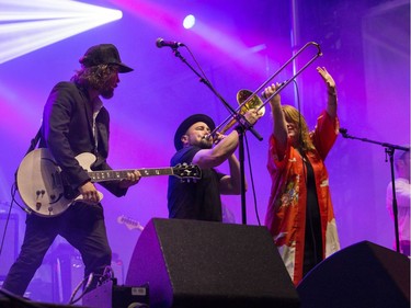 Broken Social Scene featuring from left Kevin Drew, Evan Cranley and Amy Millan on the City Stage on Friday night. Wayne Cuddington/ Postmedia