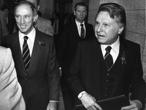 Finance Minister Allan MacEachen and Prime Minister Pierre Trudeau in the House of Commons during budget night, Nov 12, 1981. Allan MacEachen, a long-serving Liberal MP and senator from Nova Scotia who was a driving force behind many Canadian social programs, has died at the age of the 96.THE CANADIAN PRESS/ Fred Chartrand.