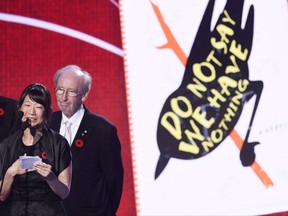 Madeleine Thien, left, gives an acceptance speech after winning the 2016 Giller Prize for her book "Do Not Say We Have Nothing" as Giller Prize founder Jack Rabinovitch looks on during an award ceremony in Toronto, Monday, Nov. 7, 2016. The Scotiabank Giller Prize will reveal the contenders for the 2017 award later this morning. Last year's winner, Madeleine Thien, will announce the long list for the $100,000 grand prize during an event in St. John's, N.L.THE CANADIAN PRESS/Frank Gunn