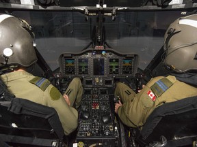 Air crew train on a Sikorsky Cyclone helicopter simulator in the Fumerton and Bing Training Center at 12 Wing Shearwater on September 15, 2017. Photo: LS Brad Upshall, 12 Wing Imaging Services, Shearwater.
