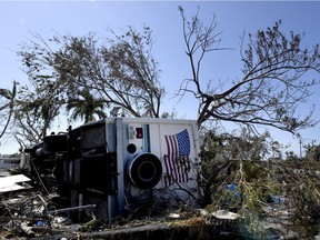A mobile home rests on its side at Venture Out Condominium Community in Cudjoe Key, Fla., Tuesday, Sept. 12, 2017 where much of the mobile homes, RVs and stick houses were damaged or destroyed by Hurricane Irma. (Taimy Alvarez/South Florida Sun-Sentinel via AP) ORG XMIT: FLLAU207

MANDATORY CREDIT          ...SOUTH FLORIDA OUT; NO MAGS; NO SALES; NO INTERNET; NO TV...
Taimy Alvarez, AP