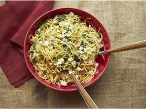 This December 2016 photo shows linguine with lemon, feta cheese and basil in New York. This dish is from a recipe by Katie Workman.