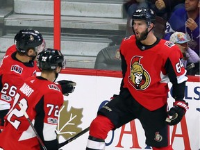 Tyler Randell, right, celebrates his first-period goal against the Maple Leafs with Senators forward Ben Sexton (26) and defenceman Thomas Chabot (72). THE CANADIAN PRESS/Fred Chartrand