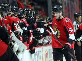 Logan Brown (51) celebrates his goal against the Canadiens with Senators teammates during the first period of Saturday's game in Ottawa. THE CANADIAN PRESS/Fred Chartrand