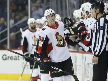 The Ottawa Senators' Alex Formenton celebrates his goal against the Winnipeg Jets during second period on Wednesday, Sept. 27, 2017.