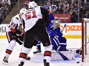 The Senators' Logan Brown and Jack Rodewald are denied by Maple Leafs goalie Frederik Andersen during an exhibition game in Toronto on Tuesday, Sept. 19, 2017.