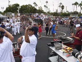 The Royal Canadian Navy culinary specialist team aboard HMCS Ottawa congratulate each other after being announced the winner of LA Fleet Week 2017 Galley Wars, a cooking competition held during the second annual Los Angeles Fleet Week. (U.S. Coast Guard photo by Petty Officer 1st Class Mark Barney/Released)