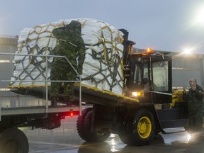 Supplies are loaded on a CC130J Hercules aircraft for transport to Texas to provide relief support for Hurricane Harvey. Photo by OS Paul Green, 8 Wing Imaging.